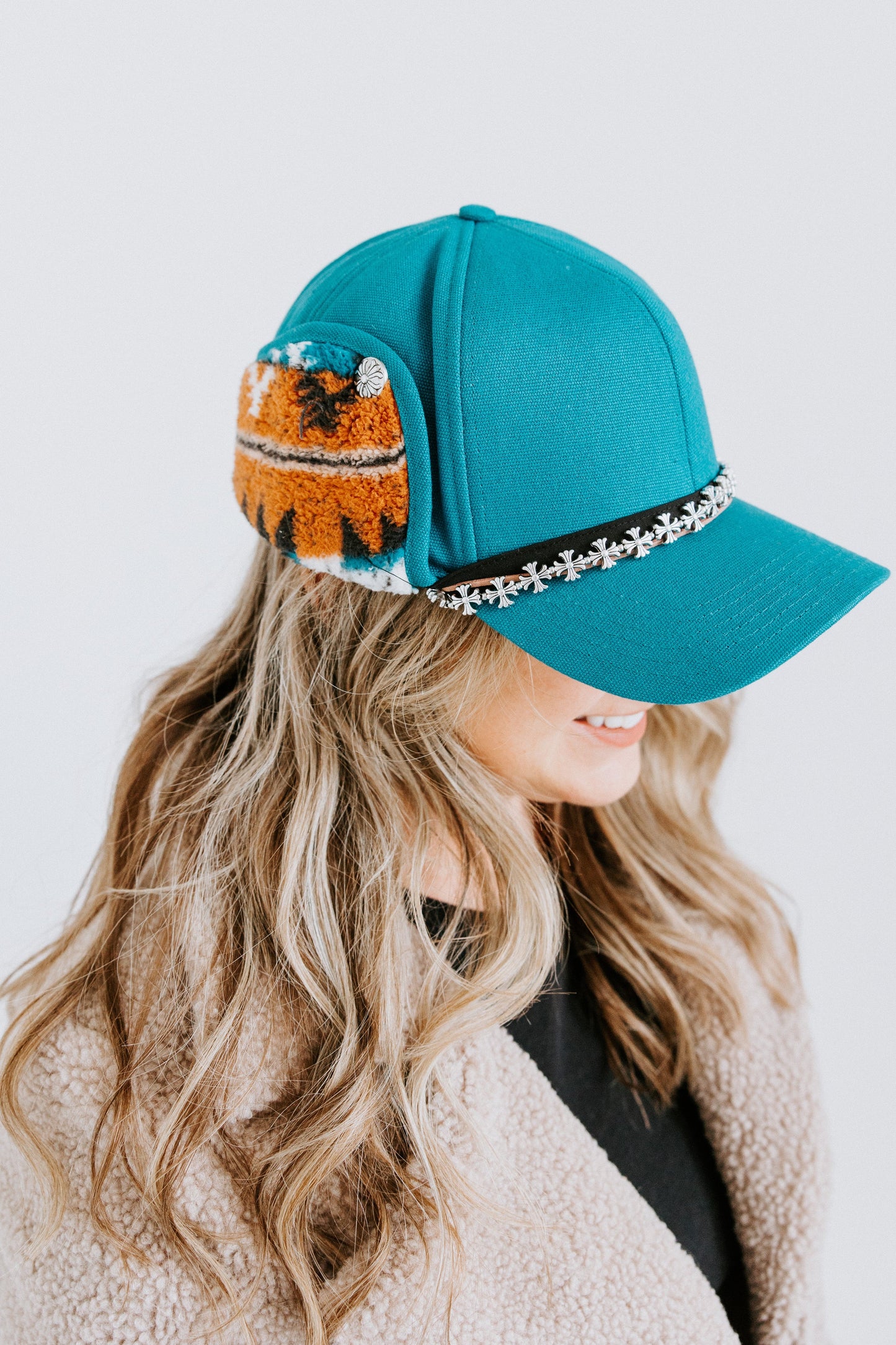Teal Spur Trapper Hat